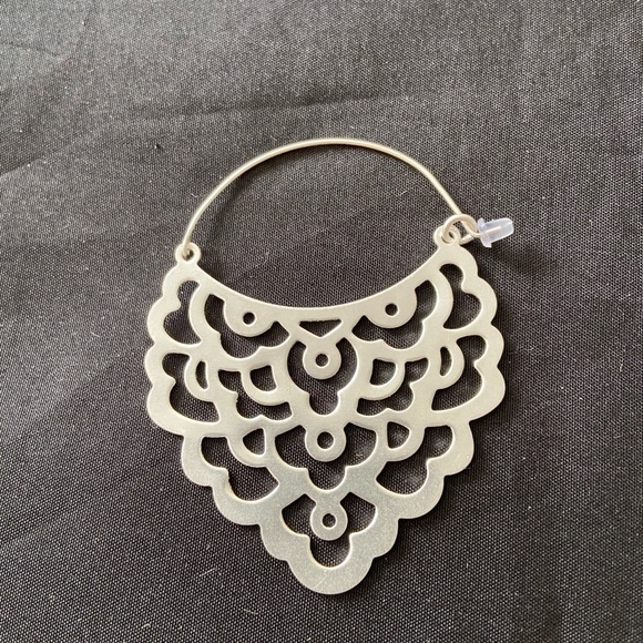 Decorative silver design with hoop closure. 2.75” - Picture 5 of 5